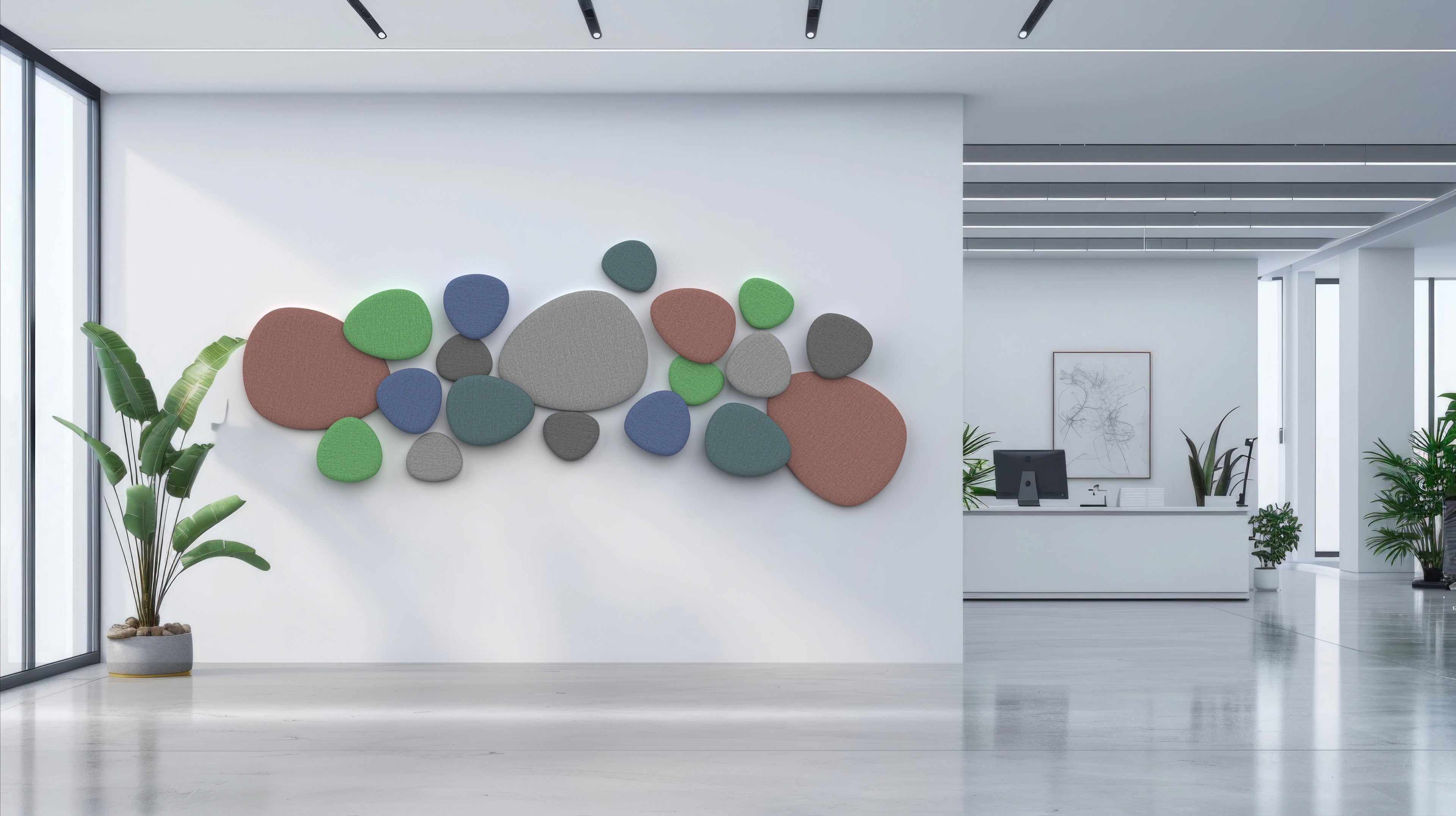 A wall-mounted, fabric-upholstered sound dampening panel in an office setting, featuring a softer green color with a geometric pattern of circles.