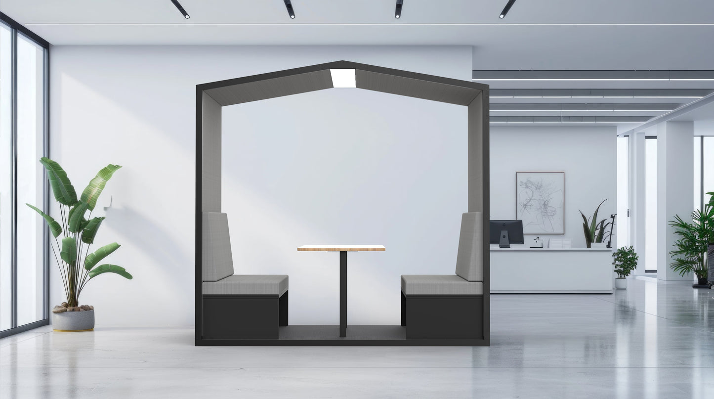 Modern office interior with a hexagonal partition, table, and chairs.