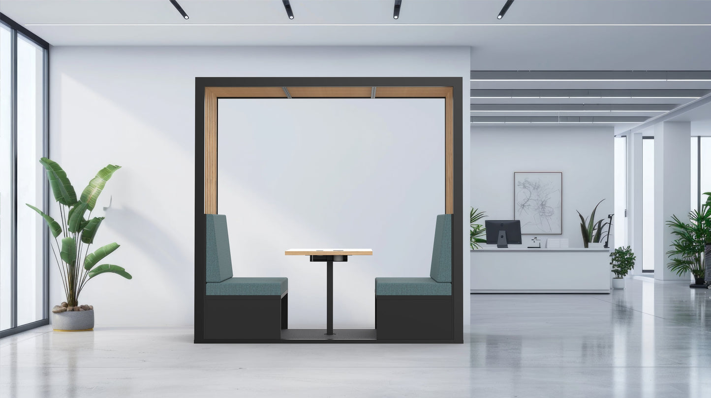 Modern office interior with a glass partition, desk, and plants.